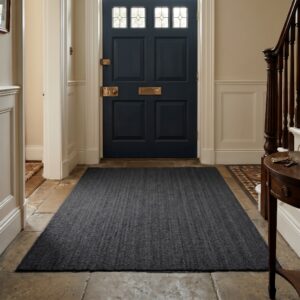dark grey coir matting in the entrance of a house