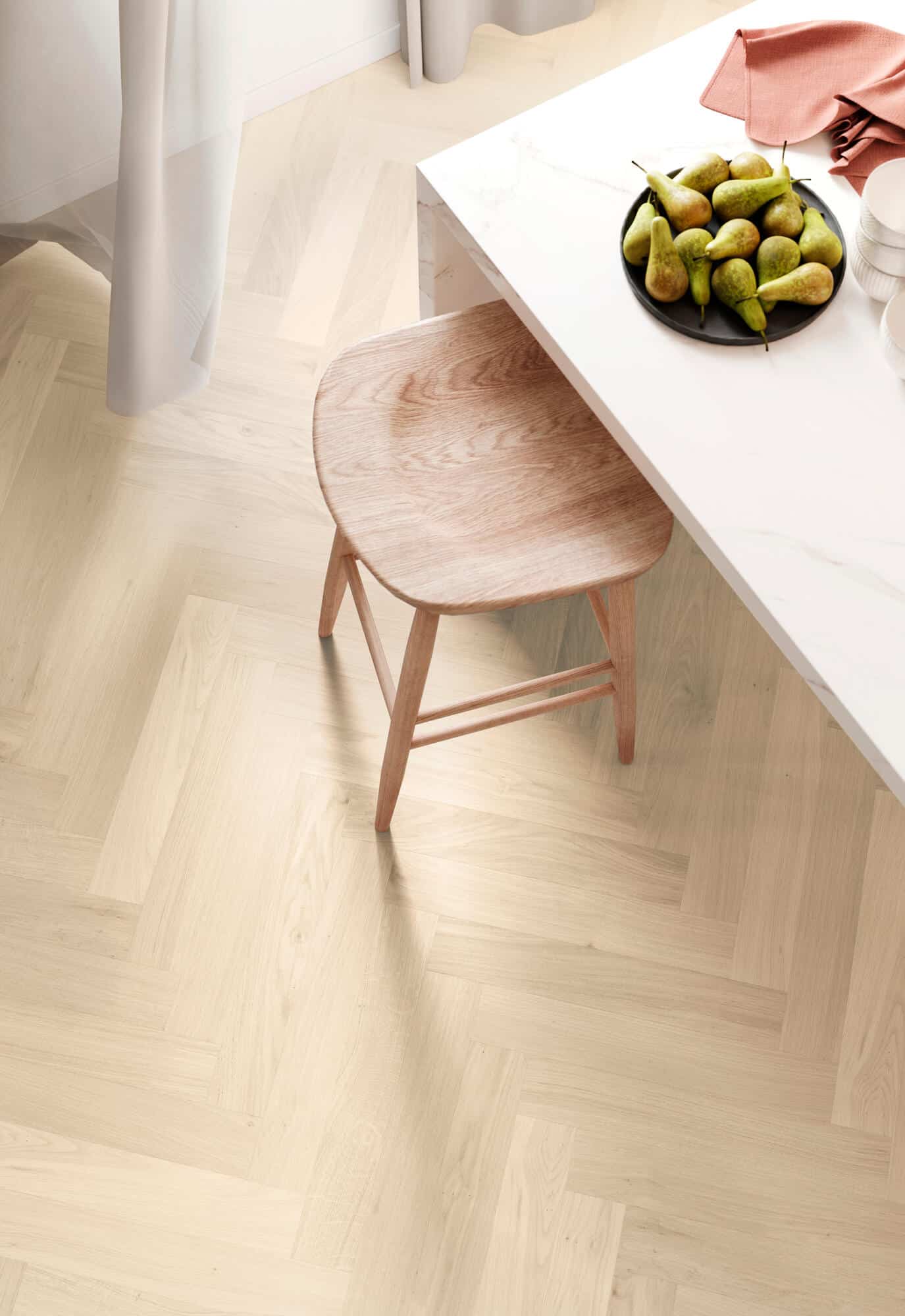 Parkwood Herringbone Albatre real oak flooring under a dining table and chair