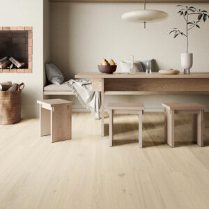 Parkwood XL Albatre real oak flooring in a dining area with a wooden table and stools