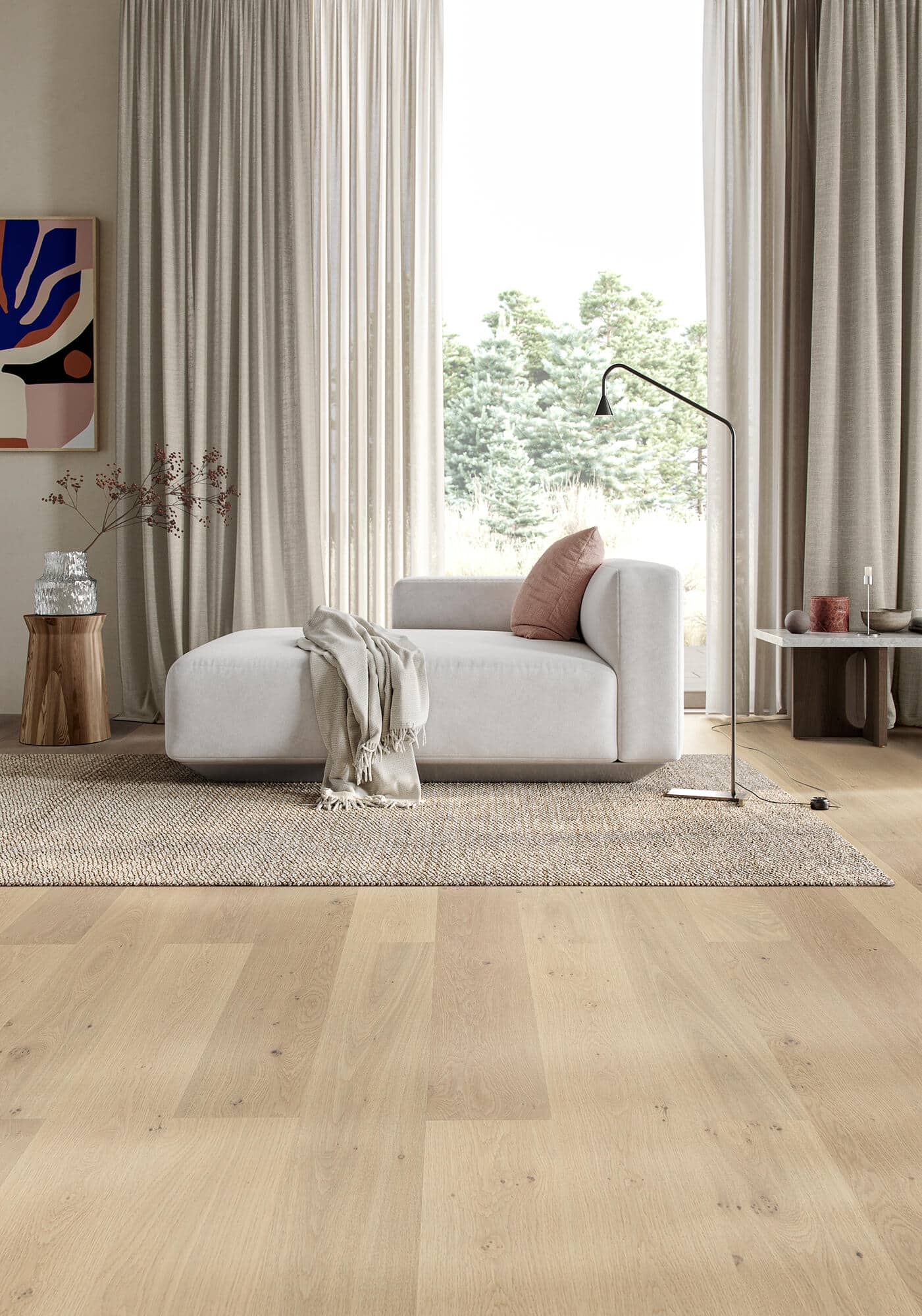 Parkwood XL Nude real oak flooring in a living room with a white sofa and rug